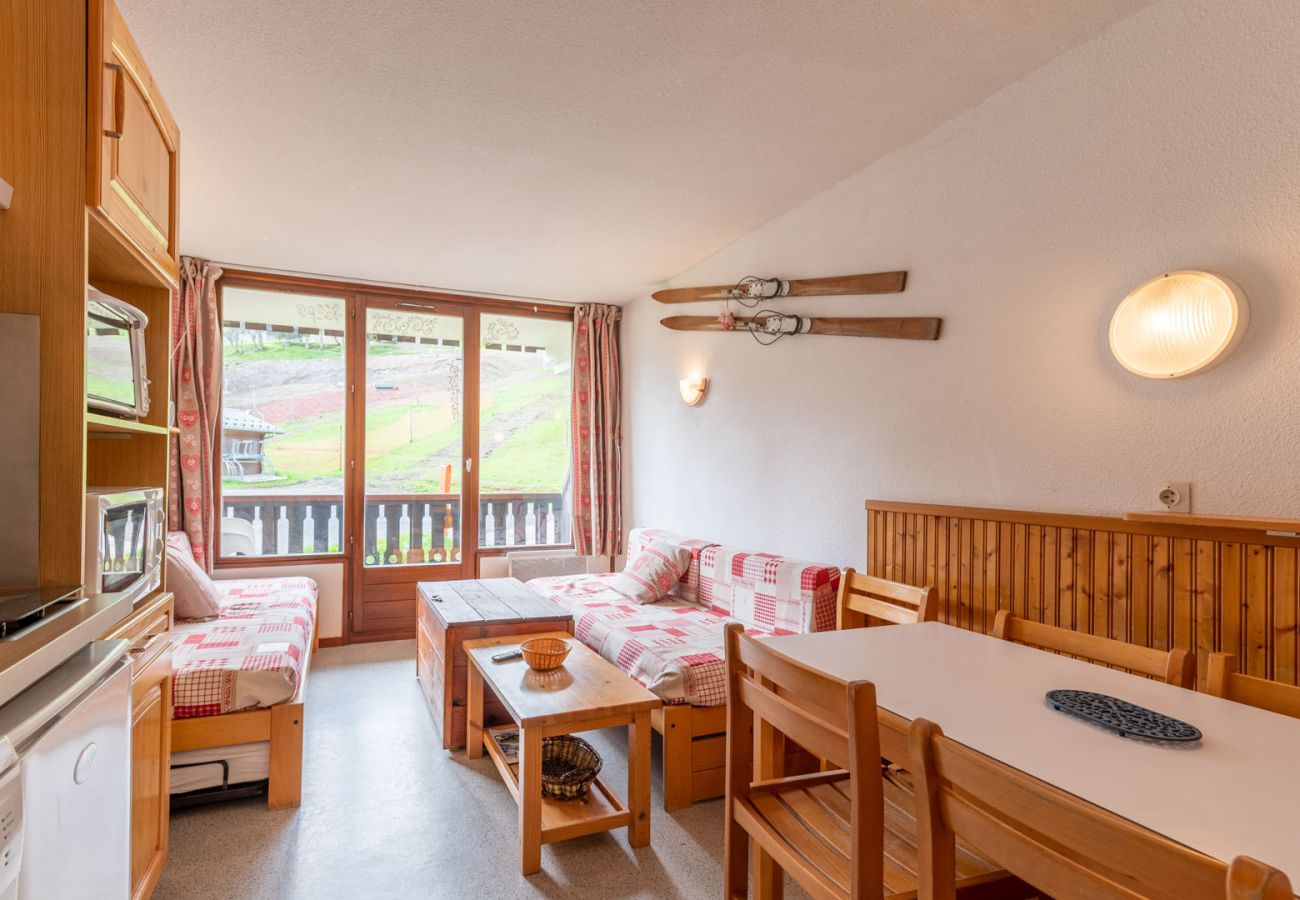 Bright living room with a view from the ski runs